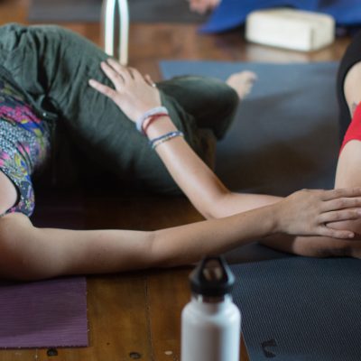 connecting during partner yoga in Montanita